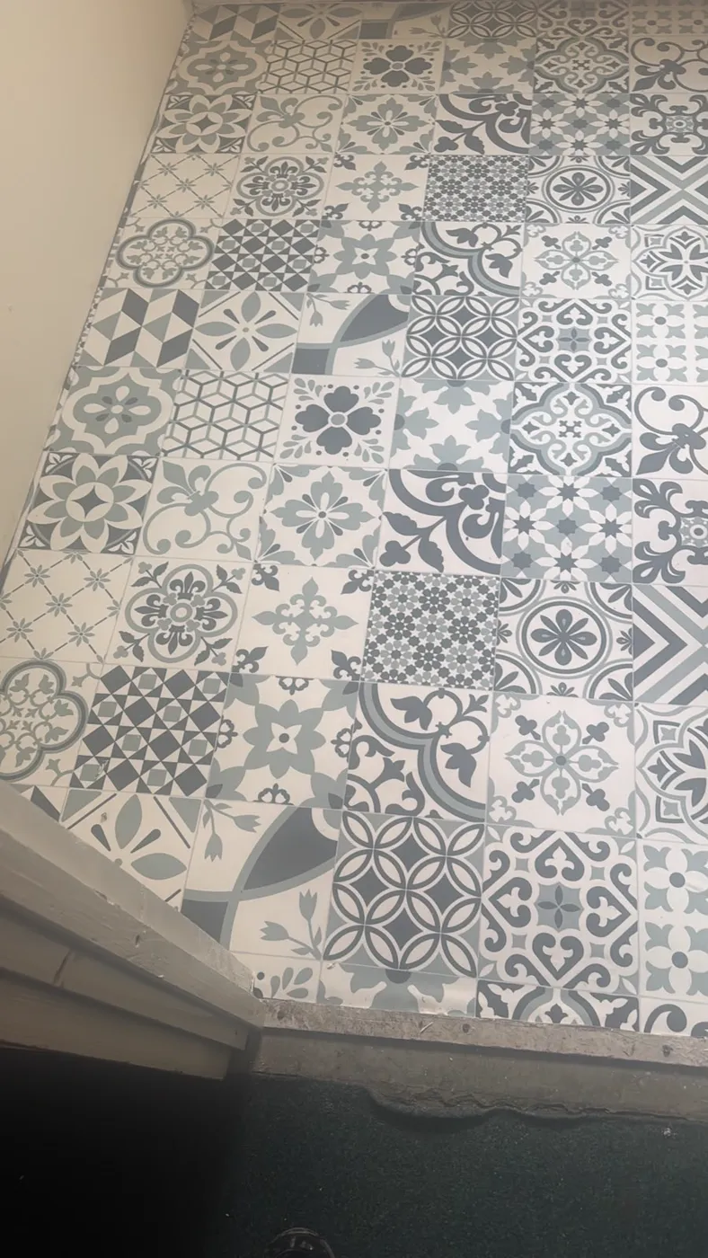 Patterned grey and white tile floor